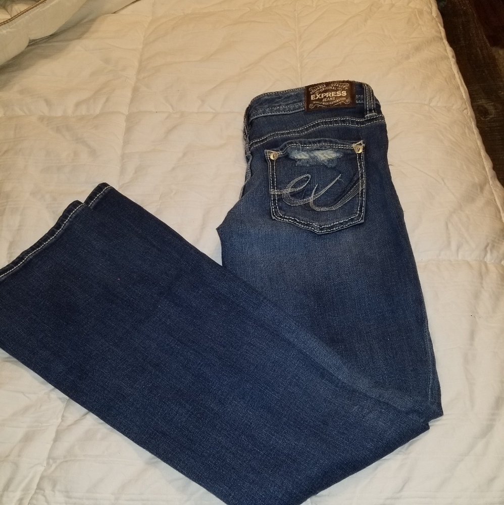 Express boot cut distressed low rise jeans